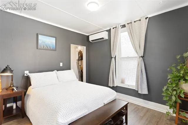 a room with wooden furniture and a wooden floor