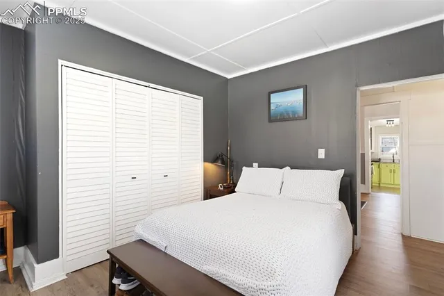 a view of a workspace with furniture and bathroom