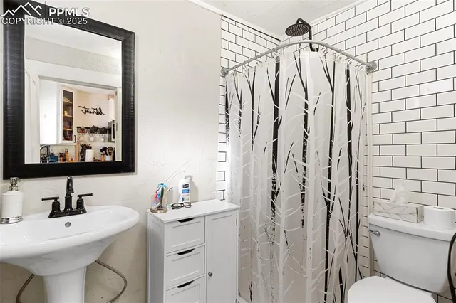 a workspace with furniture and wooden floor