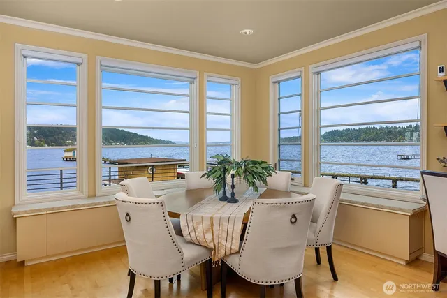 a dining room with furniture and window
