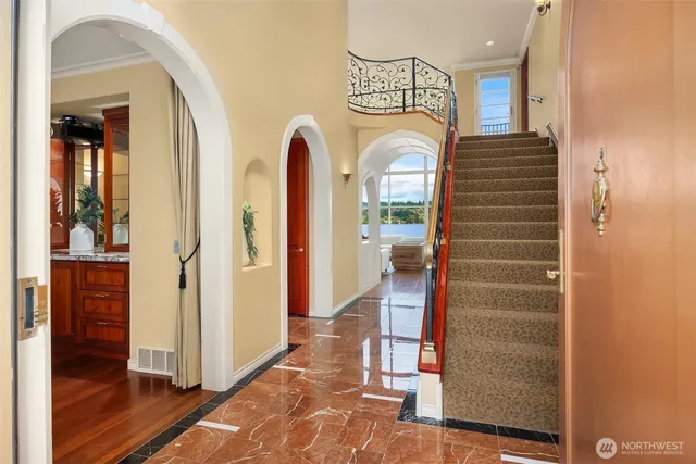 a view of front door with stairs