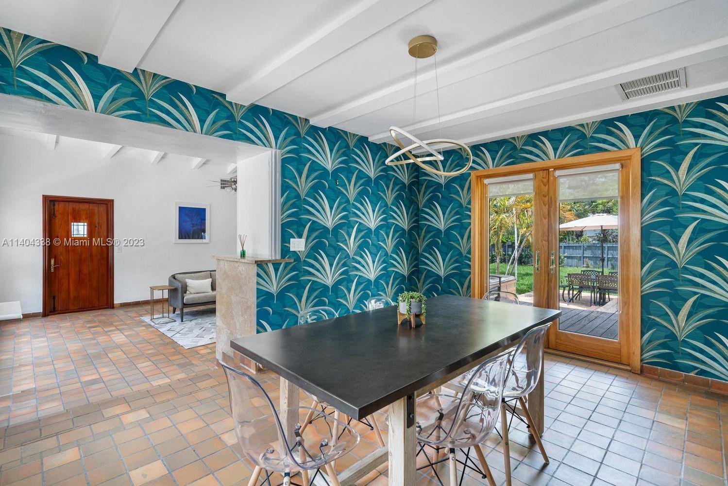 2500 Flamingo Drive Miami Beach, FL 33140 - Photo 19 of 27 a view of a dining room with furniture and window