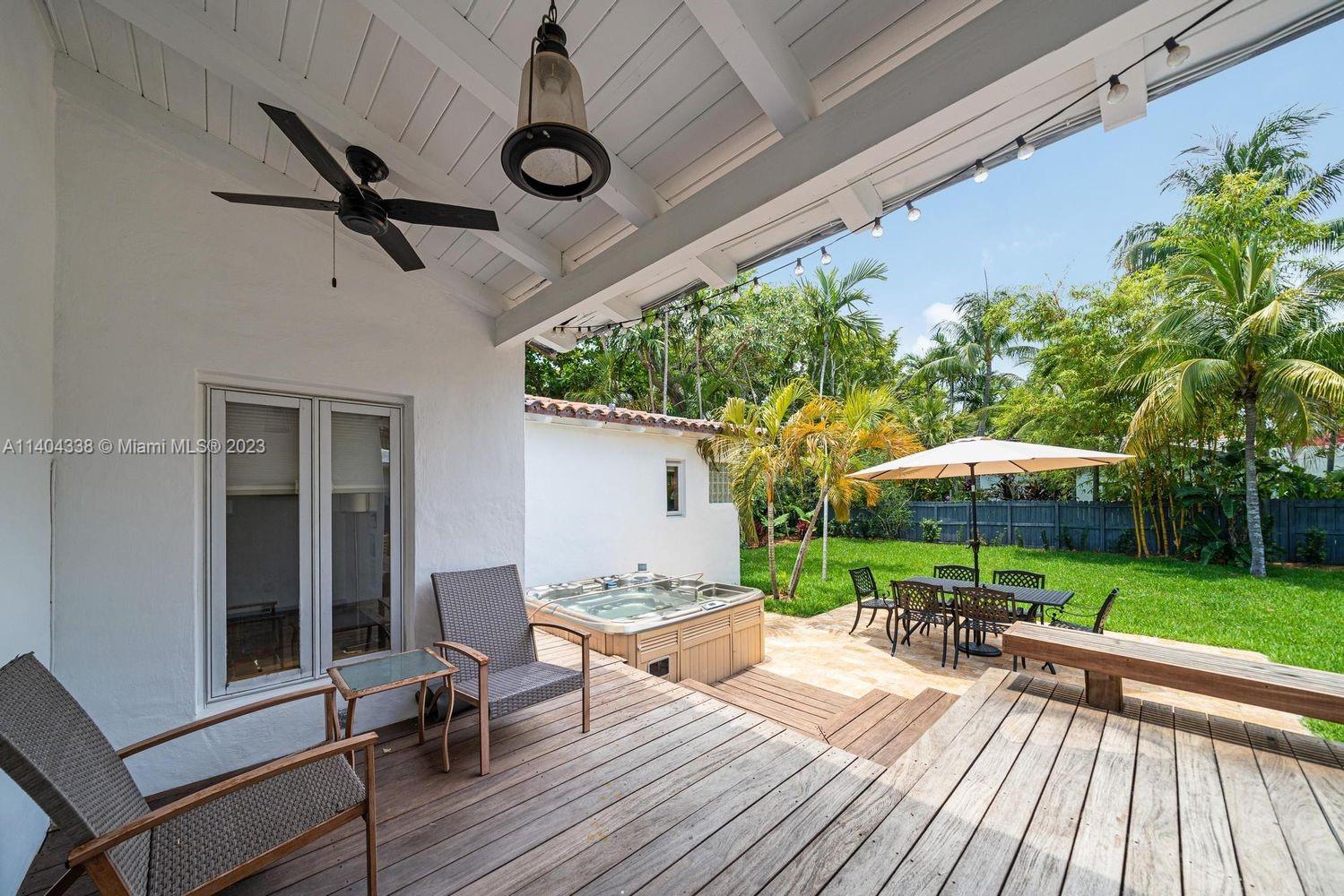 2500 Flamingo Drive Miami Beach, FL 33140 - Photo 20 of 27 a view of a house with backyard and sitting area