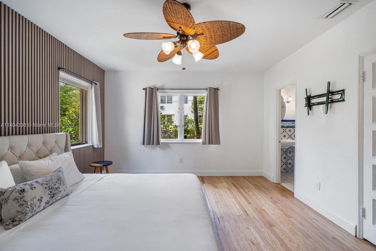 2500 Flamingo Drive Miami Beach, FL 33140 - Photo 8 of 27 a bedroom with a bed and a window