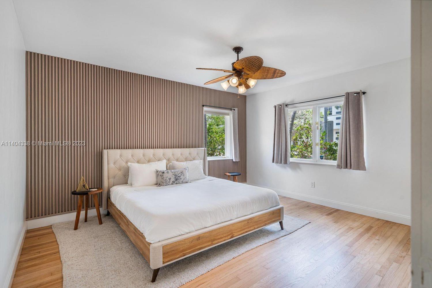 2500 Flamingo Drive Miami Beach, FL 33140 - Photo 9 of 27 a bedroom with a bed and a window