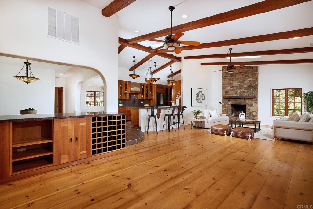 2931 Lone Jack Road Encinitas, CA 92024 - Photo 11 of 40 a living room with furniture and a fireplace