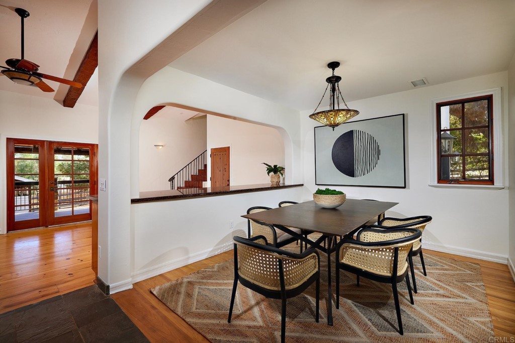 2931 Lone Jack Road Encinitas, CA 92024 - Photo 12 of 40 a view of a dining room with furniture and wooden floor