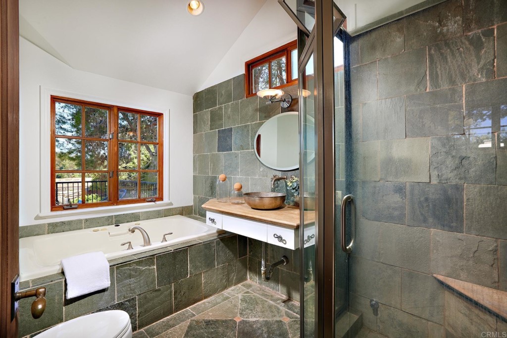 2931 Lone Jack Road Encinitas, CA 92024 - Photo 18 of 40 a bathroom with a sink toilet and shower