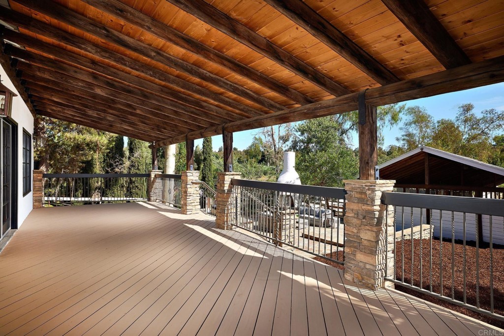 2931 Lone Jack Road Encinitas, CA 92024 - Photo 21 of 40 a view of a deck with wooden floor and outdoor space