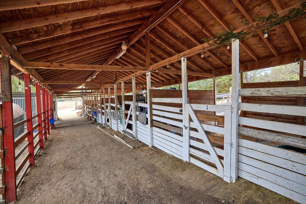 2931 Lone Jack Road Encinitas, CA 92024 - Photo 35 of 40 a view of an empty room with wooden floor