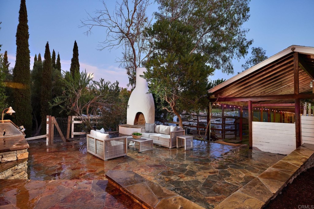 2931 Lone Jack Road Encinitas, CA 92024 - Photo 4 of 40 a view of a house with backyard and sitting area