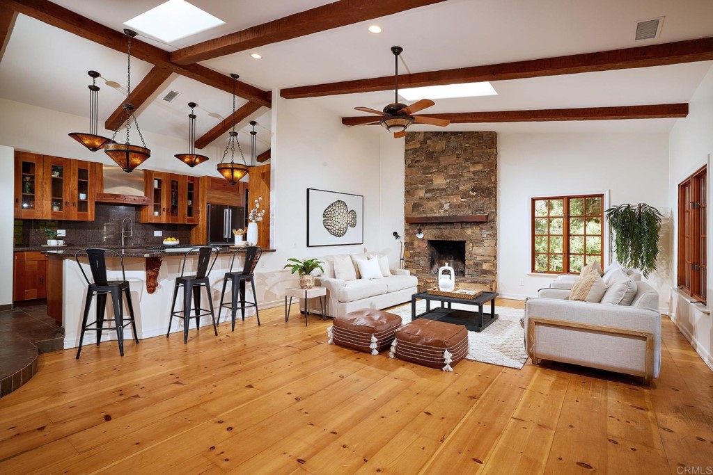 2931 Lone Jack Road Encinitas, CA 92024 - Photo 8 of 40 a living room with furniture and a fireplace