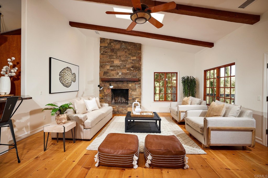 2931 Lone Jack Road Encinitas, CA 92024 - Photo 10 of 40 a living room with furniture and a fireplace