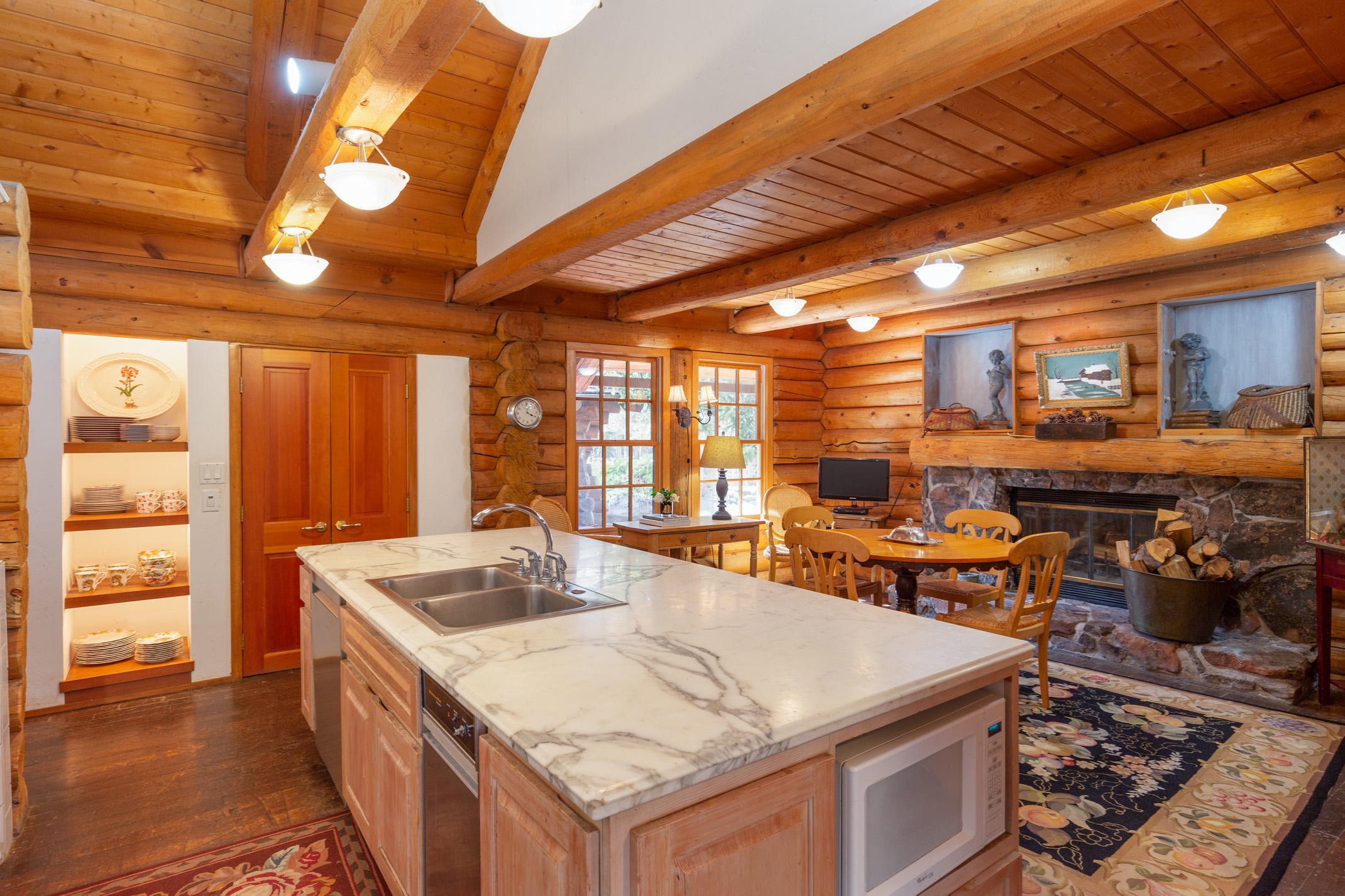 1305 Red Butte Drive Aspen, CO 81611 - Photo 9 of 22 Kitchen Nook and Fireplace Area