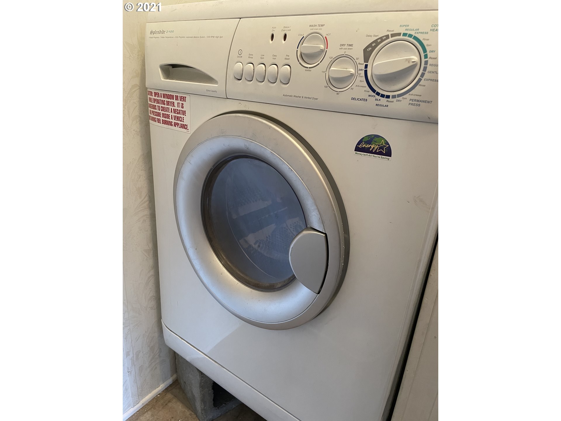 19776 Southeast Stark Street Portland, OR 97233 - Photo 11 of 18 a utility room with dryer and washer