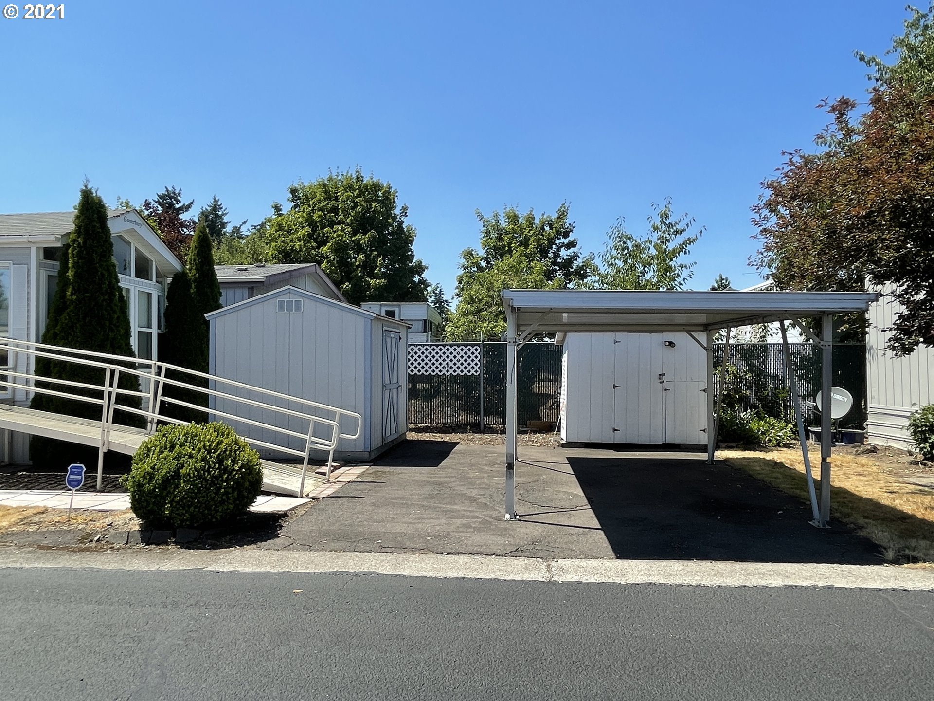 19776 Southeast Stark Street Portland, OR 97233 - Photo 14 of 18 a view of a house with a yard