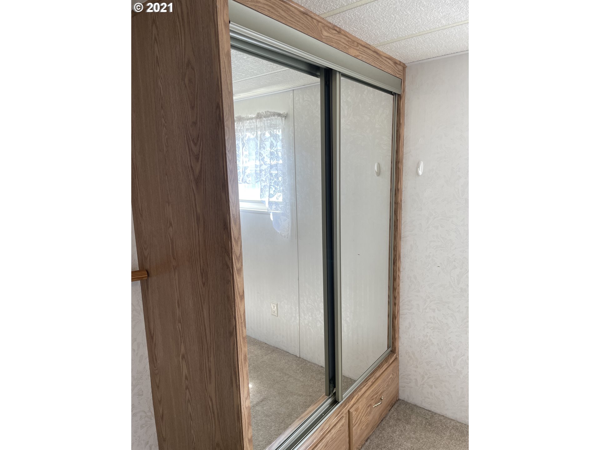 19776 Southeast Stark Street Portland, OR 97233 - Photo 8 of 18 a view of a bathroom with a glass door