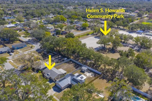 a house with trees in the background
