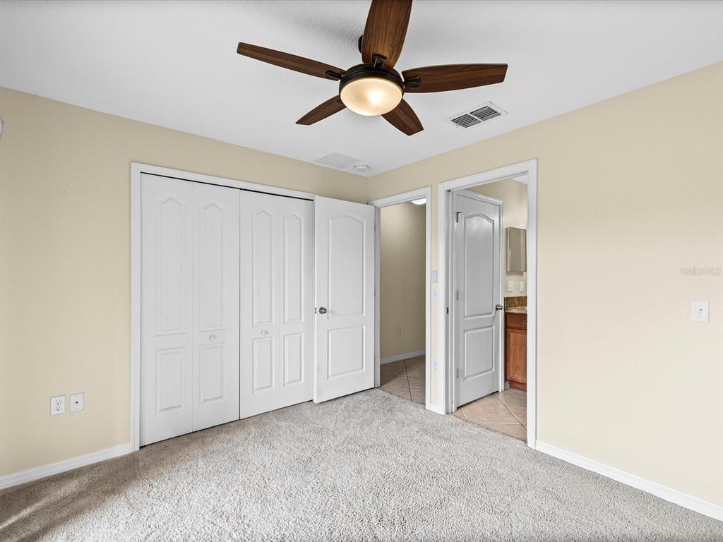 9779 Trumpet Vine Loop Trinity, FL 34655 - Photo 23 of 33 a view of an empty room