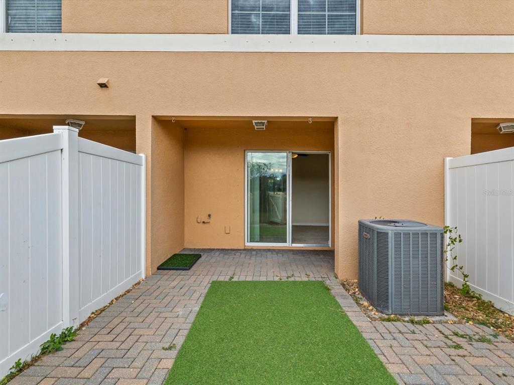 9779 Trumpet Vine Loop Trinity, FL 34655 - Photo 29 of 33 a view of backyard with cabin