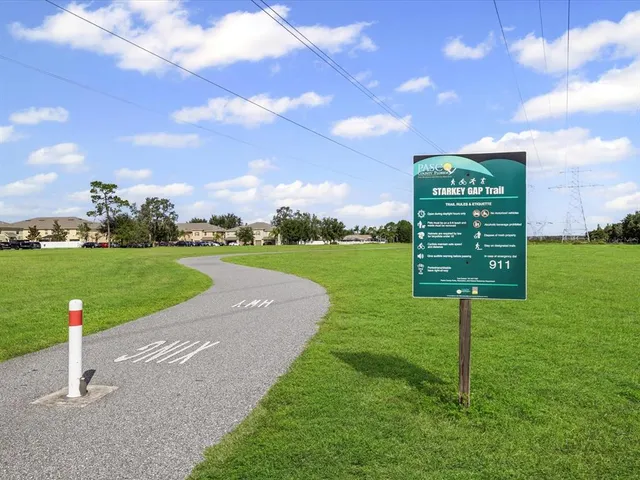 a view of a golf course with a garden