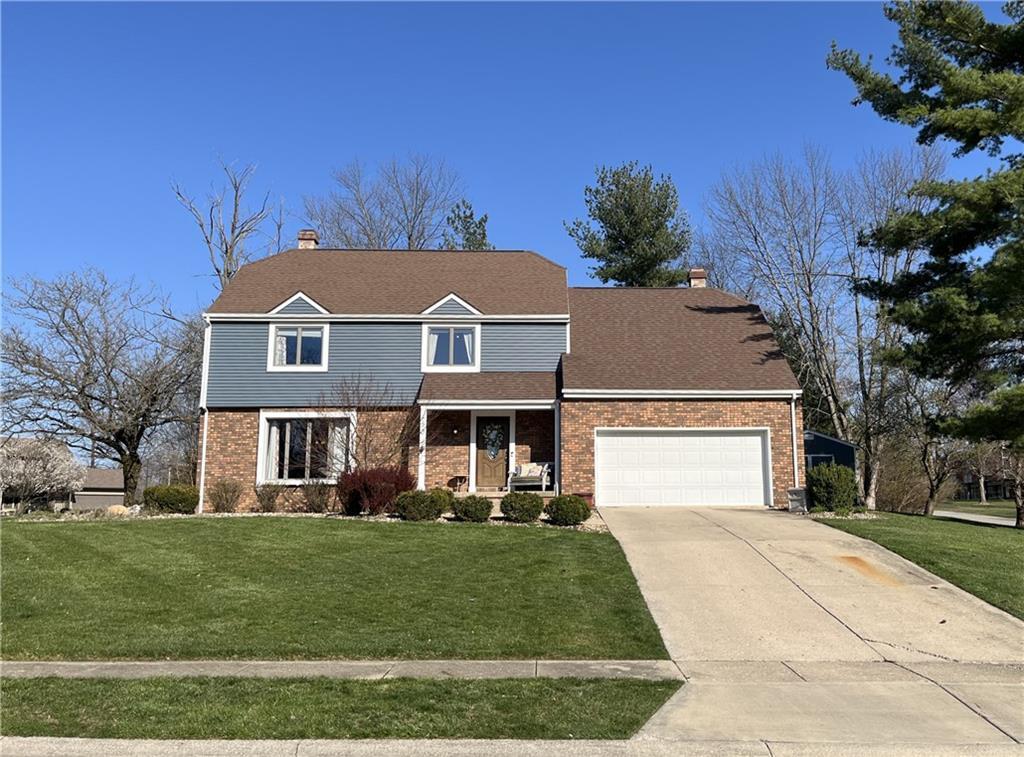 770 Country Manor Drive Decatur, IL 62521 - Photo 1 of 1 a front view of a house with a garden