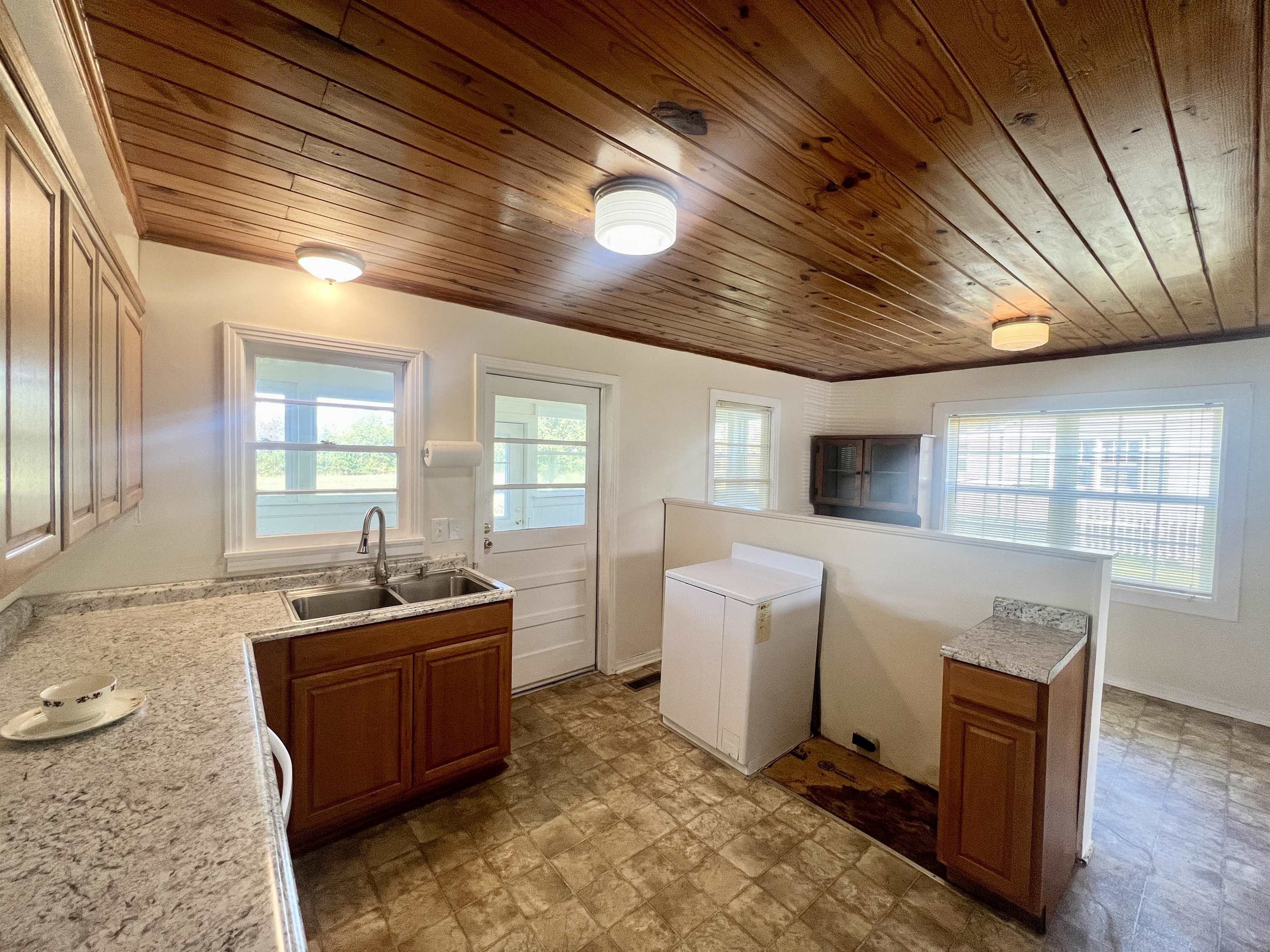 206 Willow Drive Adamsville, TN 38310 - Photo 2 of 21 a spacious bathroom with a tub sink and mirror