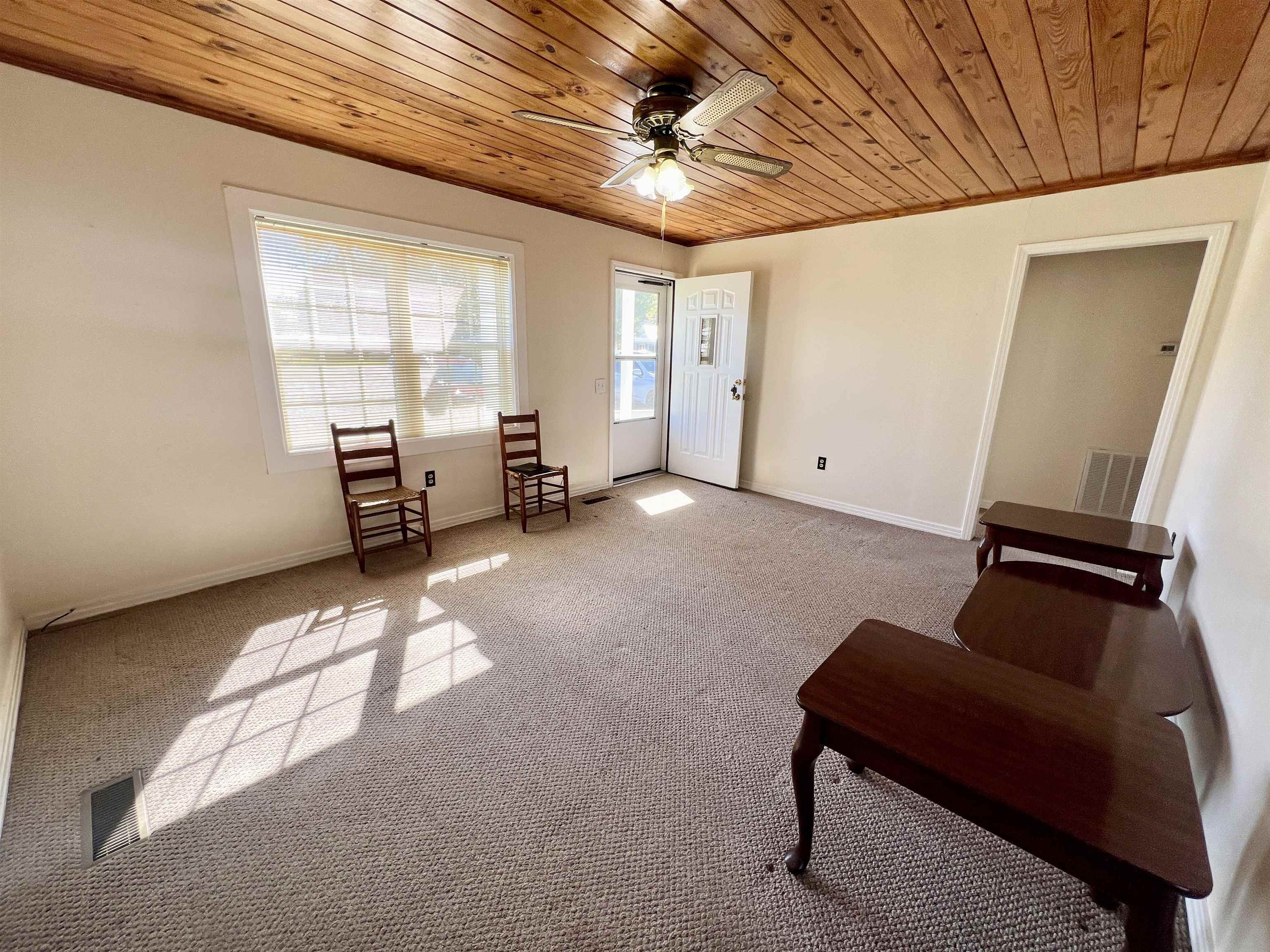 206 Willow Drive Adamsville, TN 38310 - Photo 3 of 21 a view of an empty room with a window