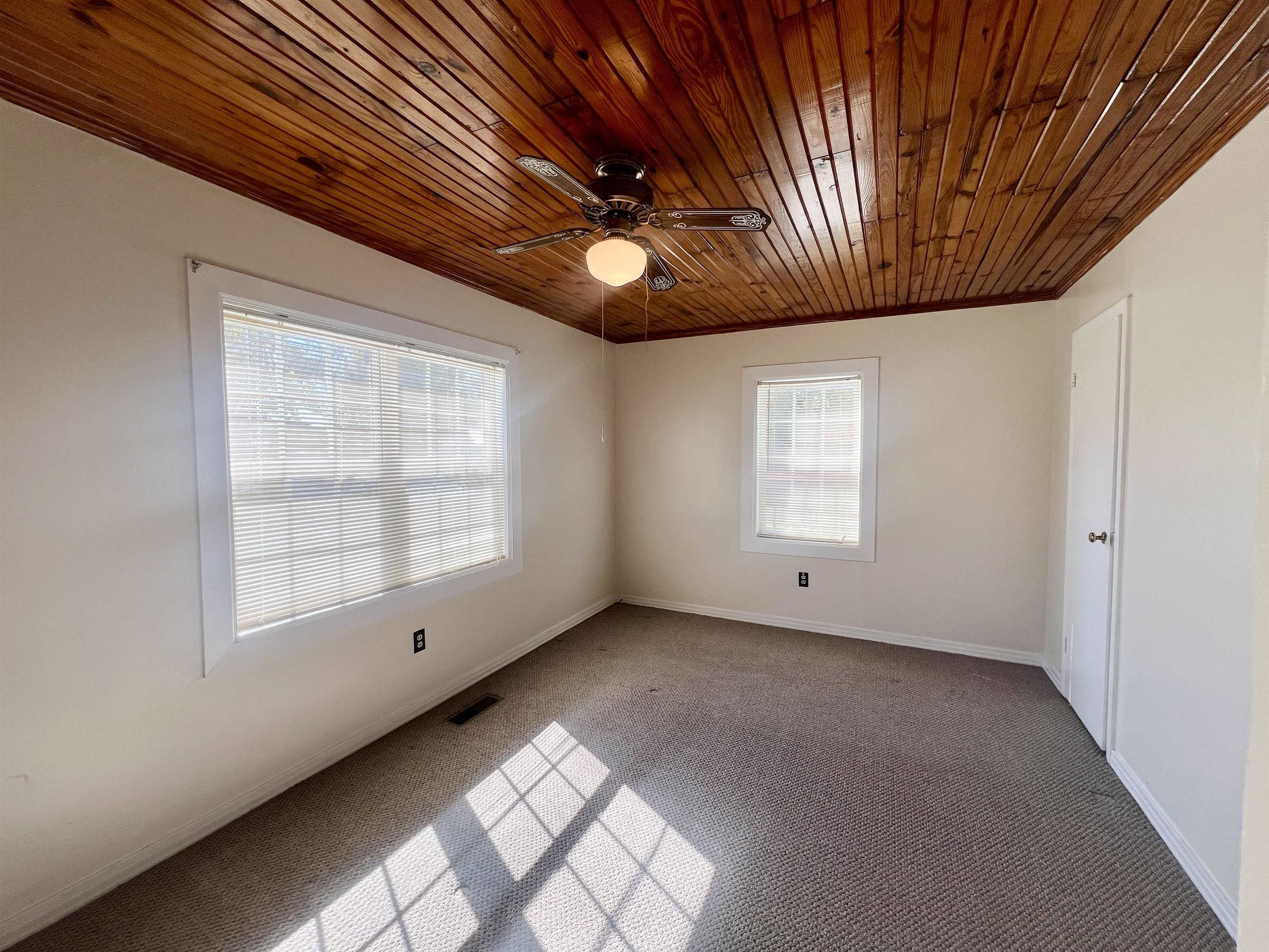 206 Willow Drive Adamsville, TN 38310 - Photo 5 of 21 a view of an empty room with a window