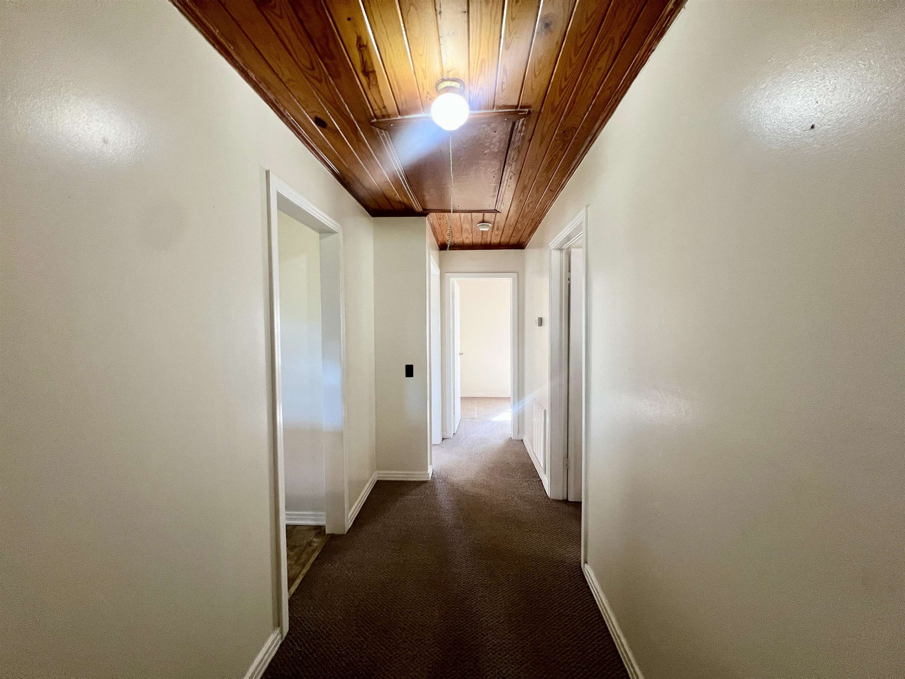 206 Willow Drive Adamsville, TN 38310 - Photo 6 of 21 a view of hallway with stairs