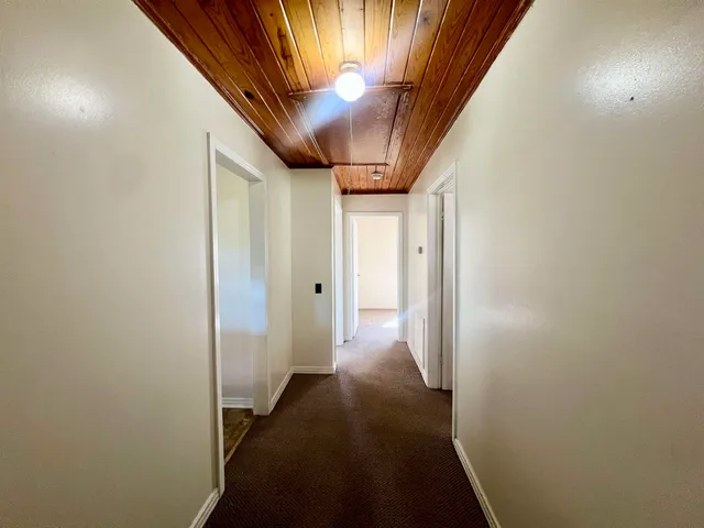 a view of hallway with stairs