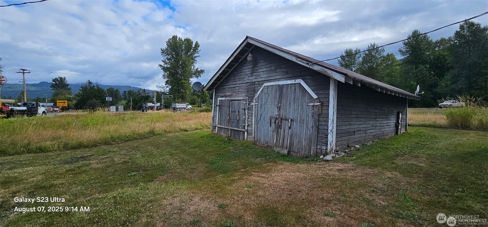 4086 Valley Highway Deming, WA 98244 - Photo 18 of 18 a view of backyard of house with wooden fence
