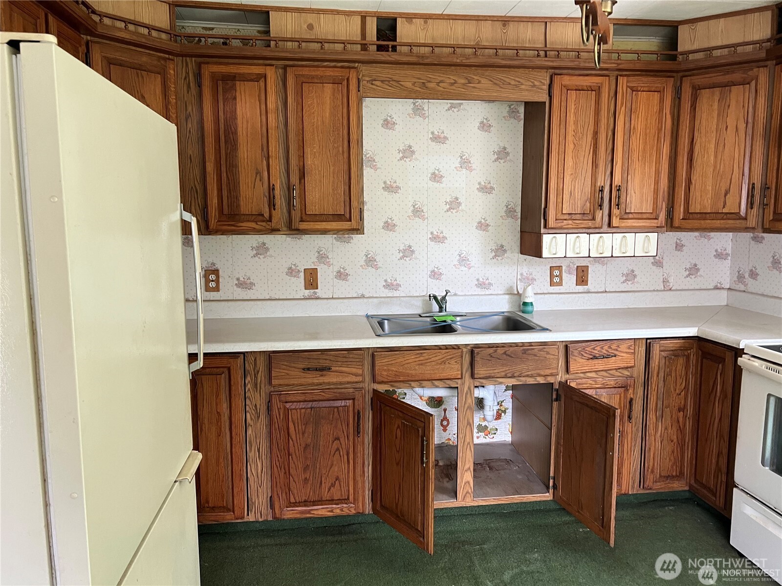 4086 Valley Highway Deming, WA 98244 - Photo 8 of 18 a kitchen with stainless steel appliances a sink and a microwave