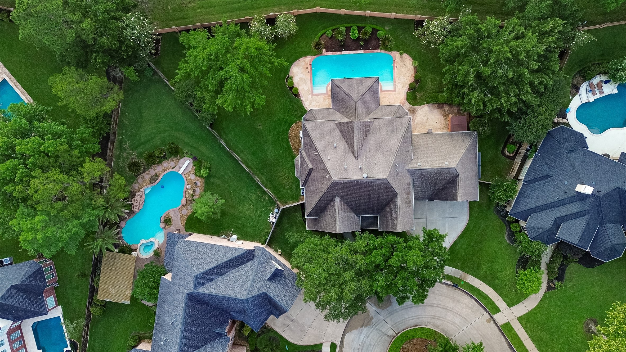 4203 Deforest Ridge Circle Katy, TX 77494 - Photo 2 of 50 Elegant Partners In Building custom home nestled on a cul-de-sac lot among mature trees and beautifully established landscaping