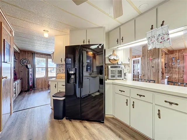 a kitchen with a sink and a window