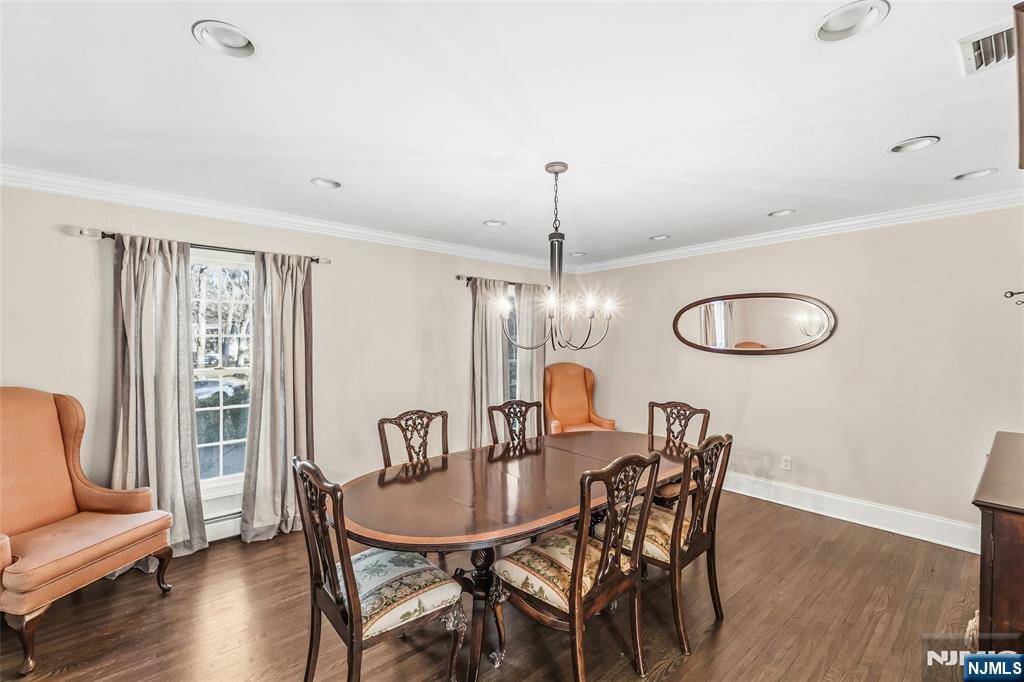 27 Pine Hill Road Old Tappan, NJ 07675 - Photo 11 of 50 a view of a dining room with furniture and wooden floor