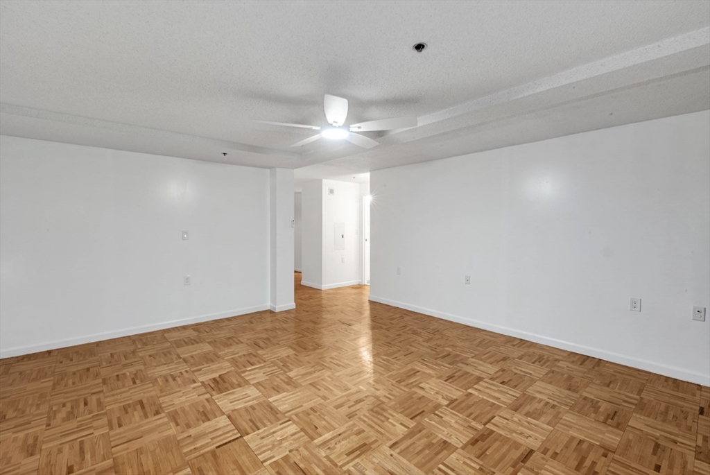 357 Commercial Street, Unit 219 Boston, MA 02109 - Photo 7 of 16 a view of an empty room