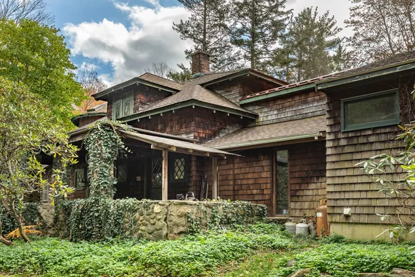 a view of an chairs and table in the patio