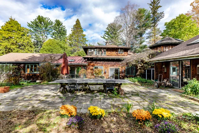 a view of an chairs and table in the patio