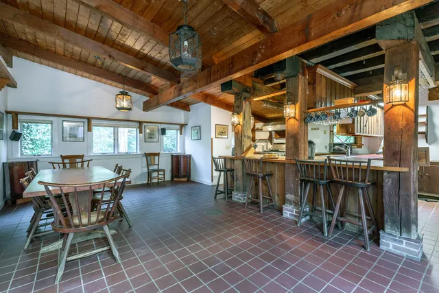 a view of a chairs and table in a patio