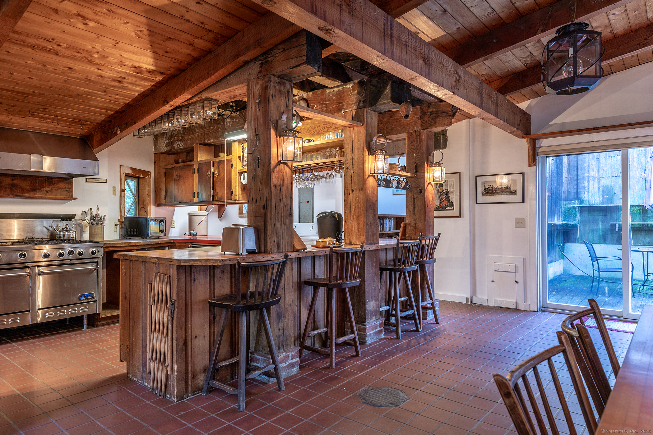 49 South Street Washington, CT 06793 - Photo 10 of 25 a view of a dining room with furniture and chandelier