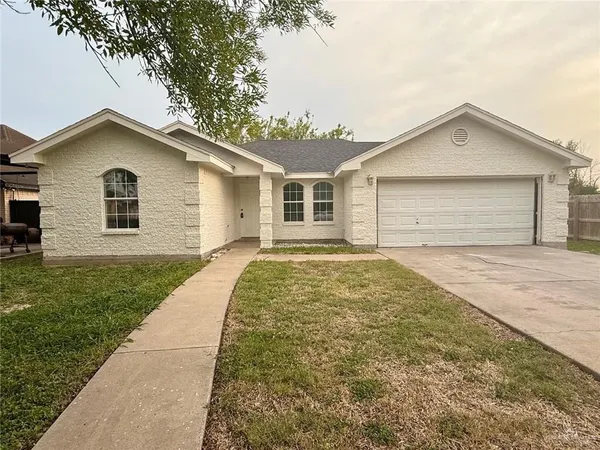 front view of a house and a yard