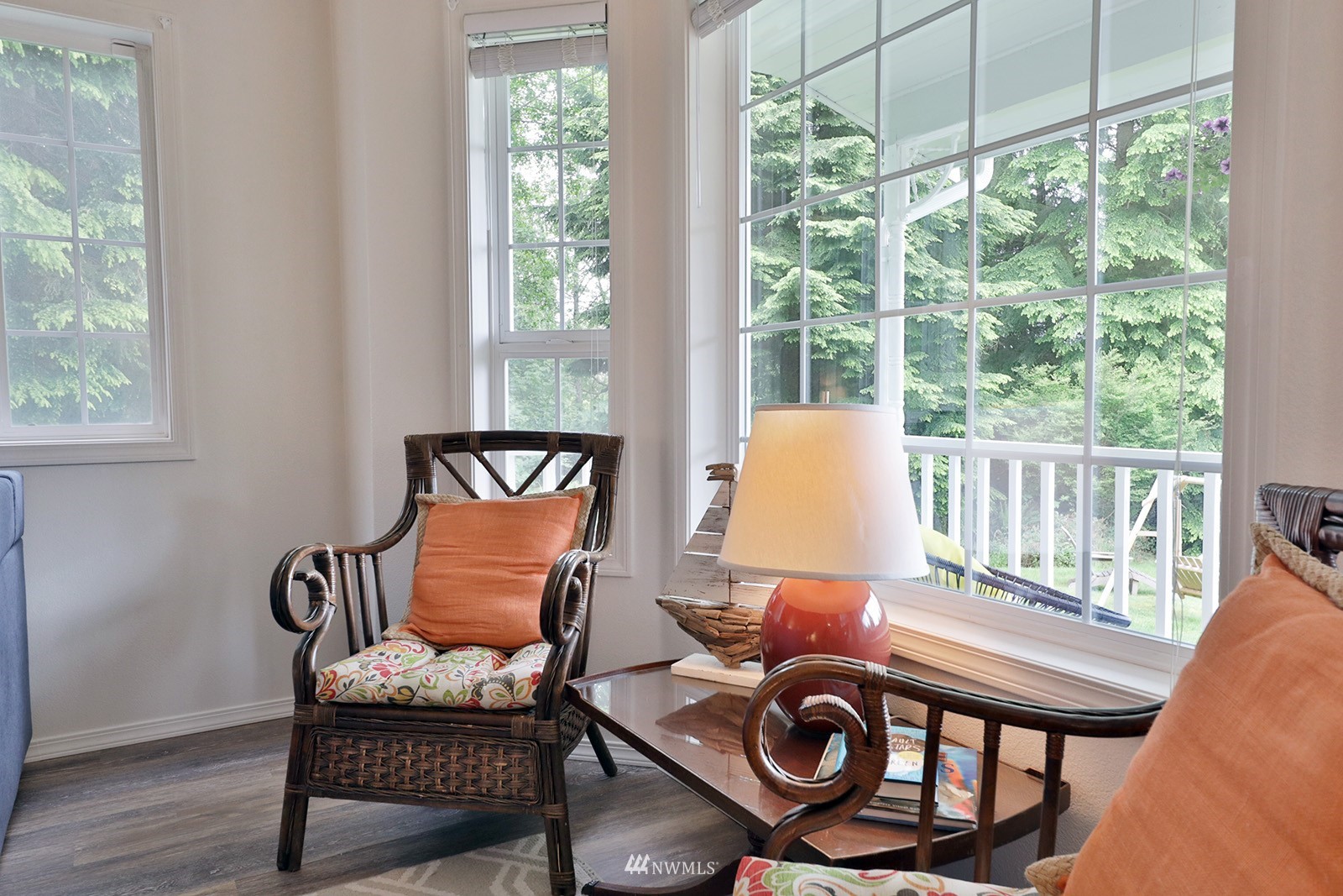 3277 East Harbor Road Langley, WA 98260 - Photo 16 of 40 a living room with furniture and a window