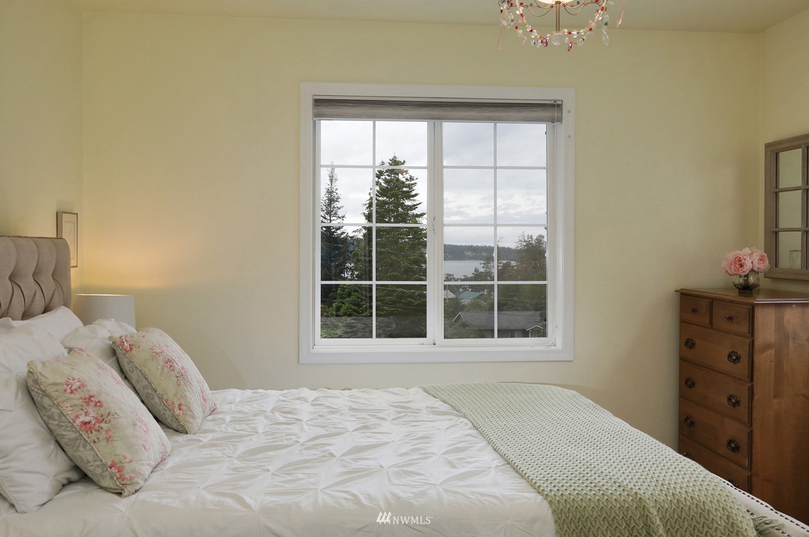 3277 East Harbor Road Langley, WA 98260 - Photo 27 of 40 a bedroom with a bed and a window
