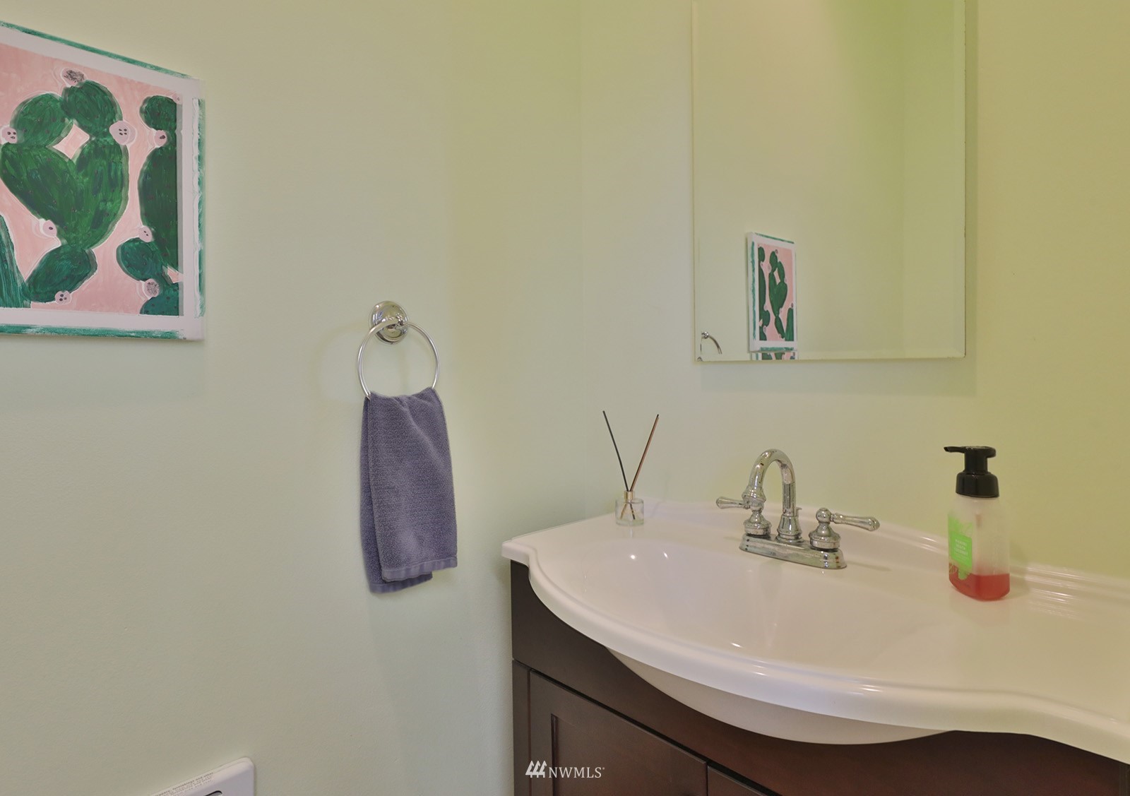 3277 East Harbor Road Langley, WA 98260 - Photo 34 of 40 a bathroom with a sink and a mirror
