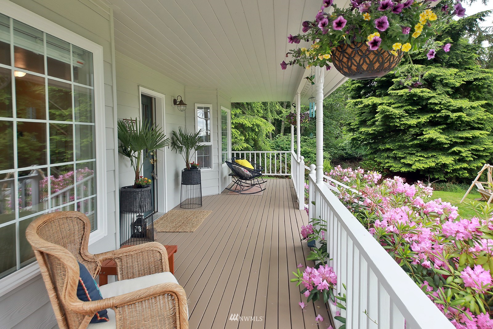 3277 East Harbor Road Langley, WA 98260 - Photo 5 of 40 a house view with a seating space and garden