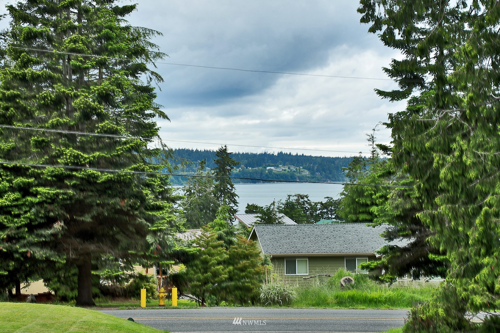 3277 East Harbor Road Langley, WA 98260 - Photo 6 of 40 a view of a house with a yard
