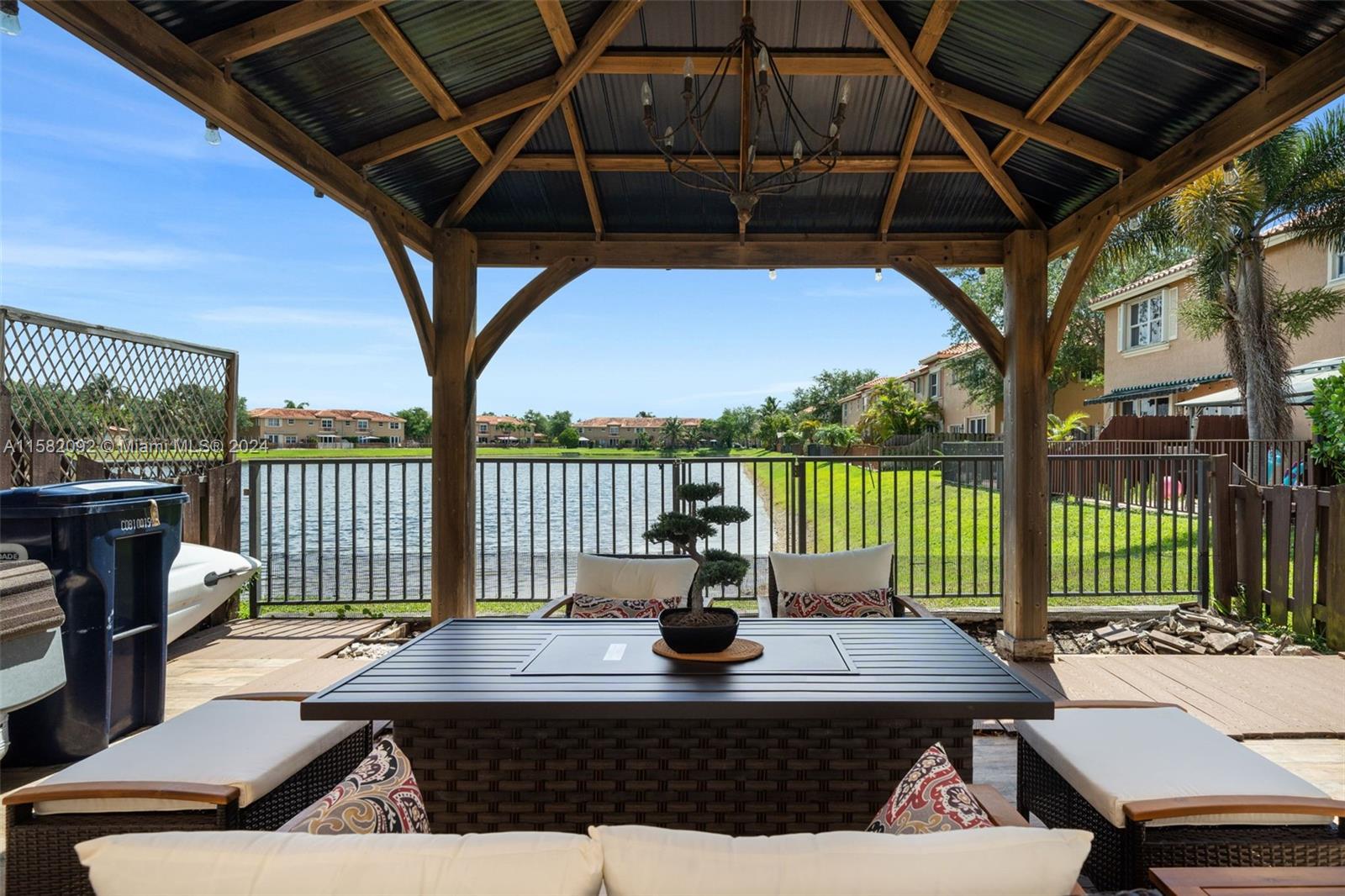 3091 Southwest 153rd Path Miami, FL 33185 - Photo 17 of 34 a view of a roof deck with a table and chairs