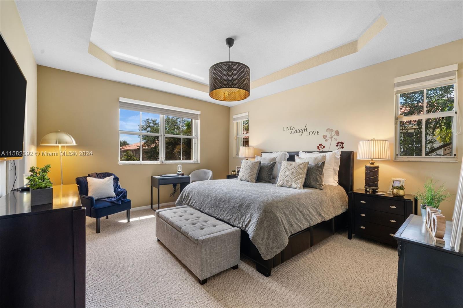 3091 Southwest 153rd Path Miami, FL 33185 - Photo 20 of 34 a spacious bedroom with a bed and window