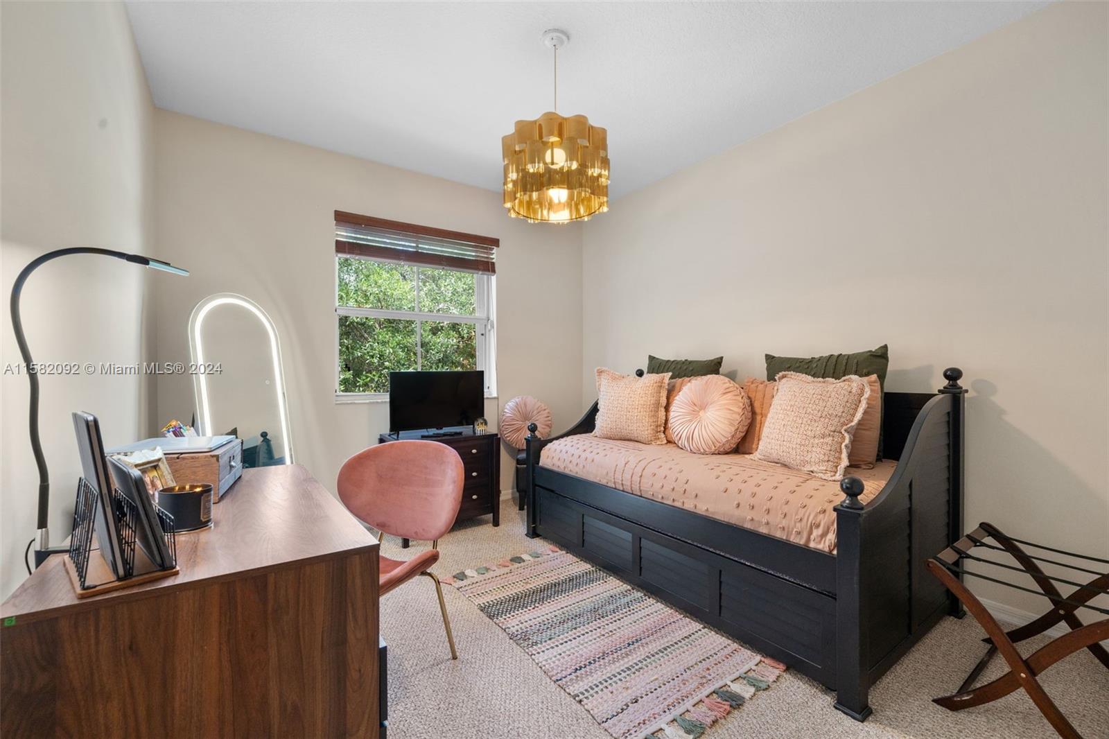 3091 Southwest 153rd Path Miami, FL 33185 - Photo 25 of 34 a living room with furniture flowerpot and a window